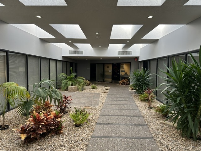 Marie Bosch office walking area with plants on both sides